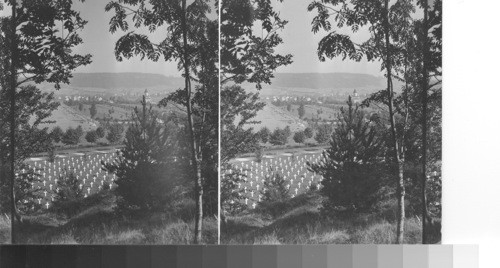 From the hill overlooking cemetery and Belleau Village. Reconstructed church beyond fir. water tower at the extreme left. looking north. France