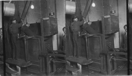 Loading Gun with 65 lb.. of rice for making puffed rice. Quaker Oats Plant, Petersborough, Ont