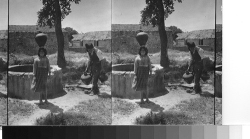 Peasants Types at a well near Alcobaça, Portugal