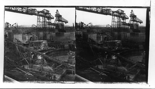 East, center and west walls of upper locks under construction, conveying concrete by chutes, Miraflores Locks, Panama