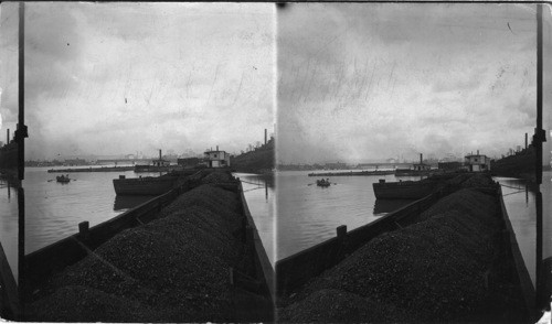 Coal barges lying below the pikes of the Ohio, Pittsburgh, Pa