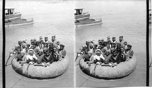 Peculiar round boats called “Kufas” on the Tigris River at Bagdad ...