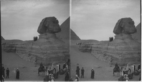 Tourists and Natives before the Sphinx (side view) Egypt