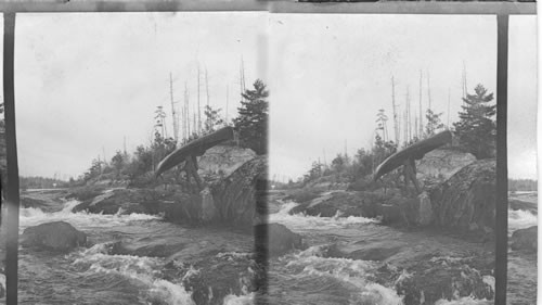 Making Portage, Moon Chute Falls, Moon River. Muskoka, Canada