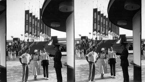 At the Main Entrance of the Century of Progress. The Stairway leading down from the 23rd Street Gates. A Uniformed Guard is directing the visitors