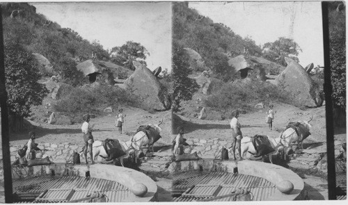 Water - carriers at one of village wells - Mt. Abu - India