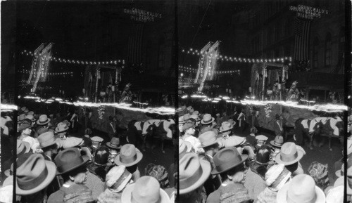 Night crowds waiting for float parade Mardi Gras, New Orleans (on Monday night Feb 15, 1926 "The Proteus " night parade. [see # 48945]