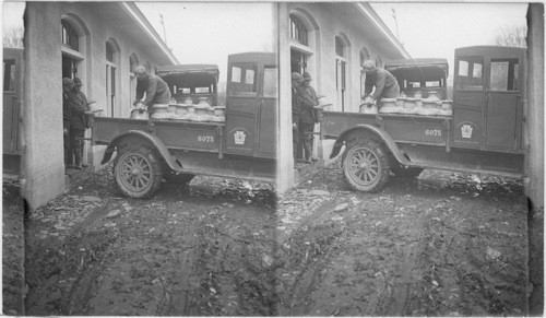 Loading cans of fingerlings for shipment. Wayne Co., Penna