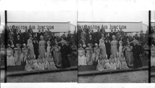 Group of people dressed as per the time of Geo. Wash [George Washington], during a similar occasion when a balloon ascended. Geo. Washington Airport, Washington,D.C