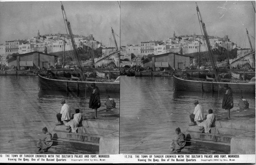 Inscribed in recto: 17,713. THE TOWN OF TANGIER CROWNED WITH THE SULTAN’S PALACE AND FORT, MOROCCO. Viewing the Quay, One of the Busiest Quarters. Copyright 1912 by Geo. Rose