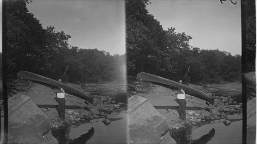 Portaging Canoe, Muskoka Lakes, Ont