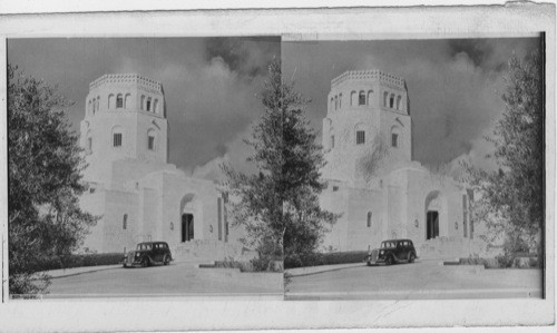 Exterior view of Museum, looking north. Olive trees frame the entrance to the Museum. Palestine