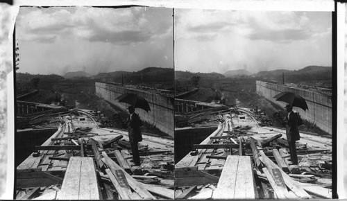 South end of Pedro Miguel Locks, showing Miraflores Lock, one and one-half mile in distance, Pedro Miguel