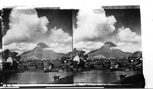 Mayon, the peerless cone of Southern Luzon, showing the old stone Spanish Bridge at Legaspi [Legazpi], Island of Luzon
