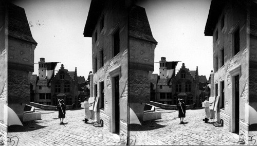 An Artist sketches in the Belgian Village