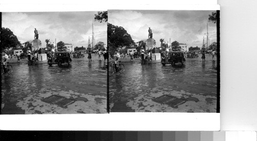 British West Indies - Island of Barbados - Bridgetown: A traffic cop pauses in his ordinary duties to make change for a pedestrian in Trafalgar Square