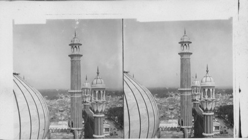 Looking north from a minaret of the greatest mosque in the world, over famous city of Delhi, India