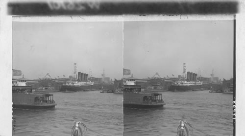 Steamship Lusitania and distant Metropolitan Tower. New York City, N.Y