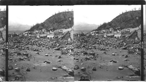 St. Pierre's principal street. Rue Victor Hugo buried in six feet of debris and ashes - Mont Pelee in distance, Martinique. Lesser Antilles