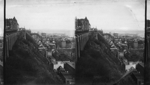 A view of Old Town below the Citadel with St. Lawrence River & C.P. Steamship Empress of Britian from Dufferin Terrace with part of Chateau Frontenac looking N.E. Canada