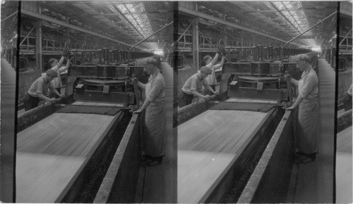 Glass polishing machine in action. Several parts of Ford /Car are used in building these machines. Ford Motor Plant, Detroit, Mich