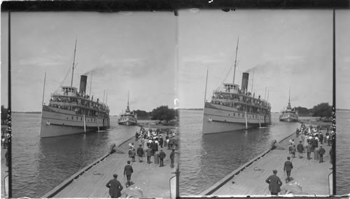 Steamer Toronto from Montreal arriving at Alexandria Bay pier, St. Lawrence River. N.Y