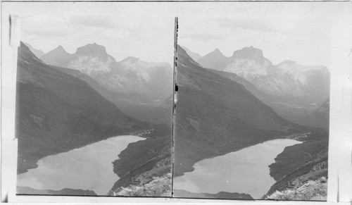 From Gunsight Pass on Continental Divide. E. over gunsight Lake. Glacier National Park - Montana