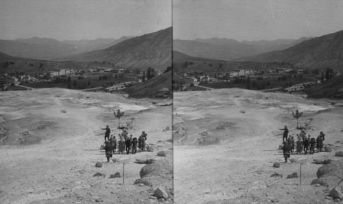 Hiking party on Terraces conducted by U.S. Forest Ranger. Yellowstone Park. Minerva left mound back