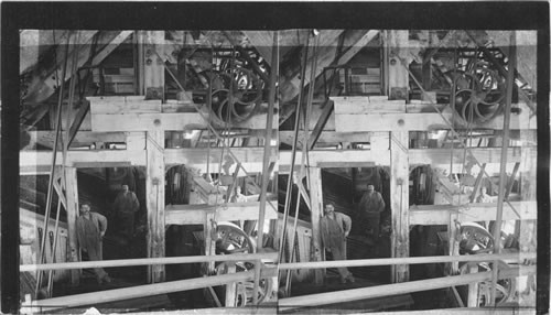 Interior shaft house #9 and 10 showing ore dump in center - crushers on right. Calumet, Michigan