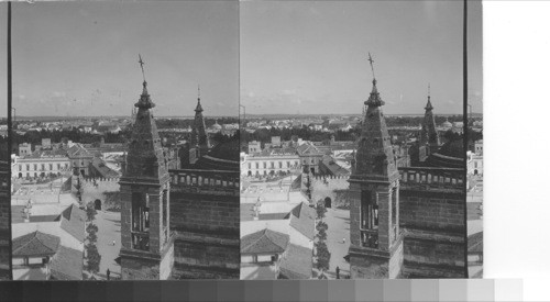 From the Giralda to the Alcazar, showing part of cathedral, Seville, Spain