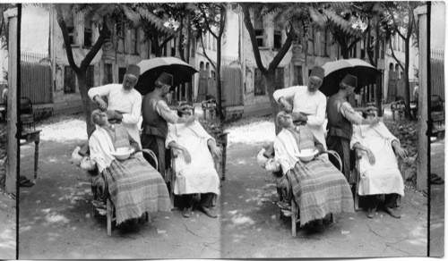 Barbers at work in the streets, Constantinople, Turkey