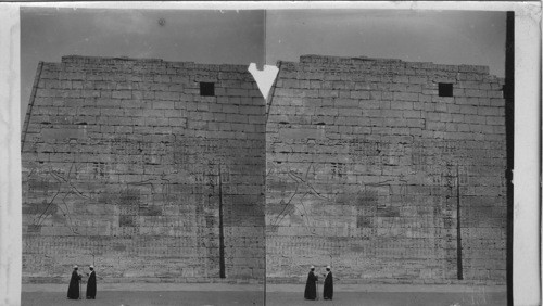 Hieroglyphics on Temple - Thebes, Egypt. Inscription, First Pylon, Main Temple of Ramses III. Medinet Habu, Thebes, Egypt