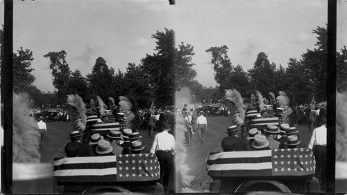 Pres. Harding in front row of cars