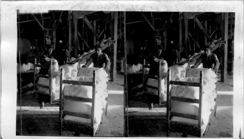 Loading Salt Sacks on Trucks Ready for Shipment. Hutchinson, Kan