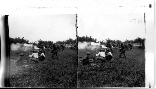 Advancing and firing across a field at Taguig in Philippines. Philippine Islands