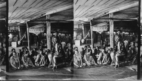 Datto Baique with his wives in the old Spanish Fort at Parang, Mindanao, P.I