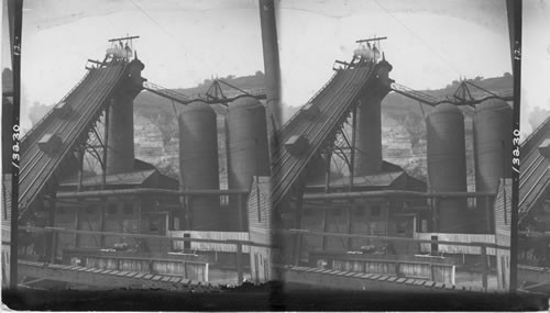 The furnace, stove and incline used to fill the furnace, making pig iron