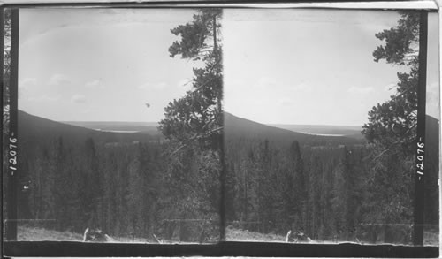 S.W. from Shoshone Point, Continental Divide, over Shoshone Lake to the Teton Mts., (60 mile distance)