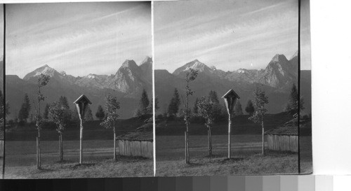 Crucifix and the Tyrolean Alps, near Garmisch Bavaria, Germany