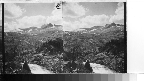 Near the flow of waters from the Dam of Saddlebag Lake, West to the Glacier of Mt. Conness, at right of Mt. Conness is Sheep Peak and North Peak, Calif. You say of this: "Fair negative, "tell me more about it, why Fair?-I would say "very good" You have good sky[,] foreground, water, high Peaks & Glazier-good scenically & geographically-