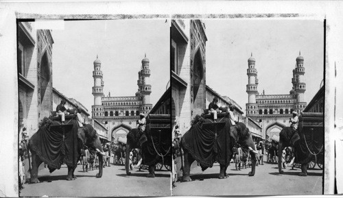 The Char Minar and passing elephants- Hyderabad. India