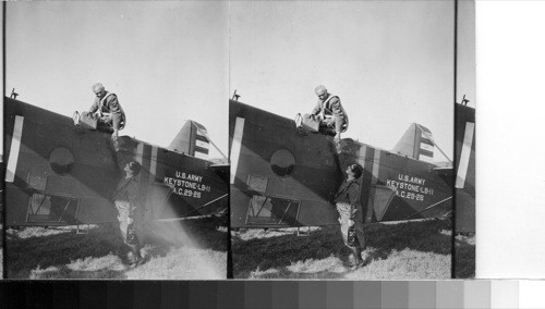 Mr. Brigandi bidding good bye to his wife before starting on his flight, he is wearing [a] parachute, Mather Field, Sacramento, Calif. [1930] [LB-11 "Panther" airplane, successor to LB-6, manufactured from 1925-1932 by Keystone Aircraft Corporation, Bristol, PA. (EWE 6/83)]