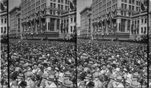 Great multitude on Canal St. New Orleans La. Waiting to see the "Rex Parade" Mardi Gras Day Feb 16/ 26