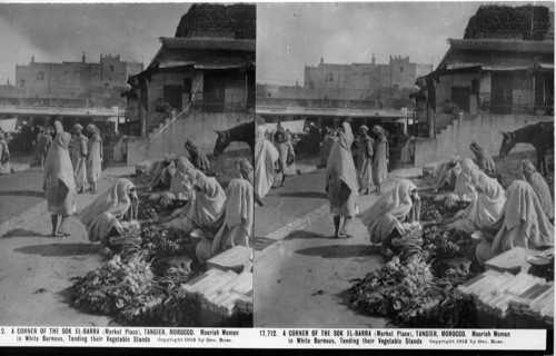 Inscribed in recto: 17,712. A CORNER OF THE SOK EL-BARRA (Market Place), TANGIER, MOROCCO. Moorish Women in White Burnous, Tending their Vegetable Stands. Copyright 1912 by Geo. Rose