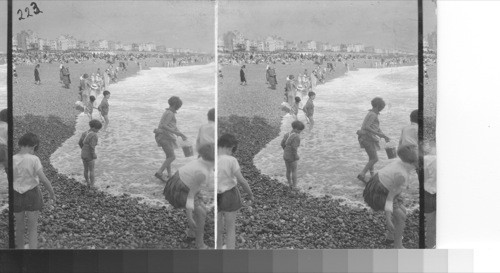 Children at beach, England