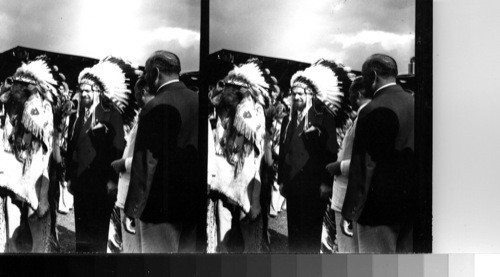 "Balbo" during Induction rites as he was made chief in the Souix [Sioux] tribe, Chief Blackhorn of the Souix [Sioux] doffing helmet