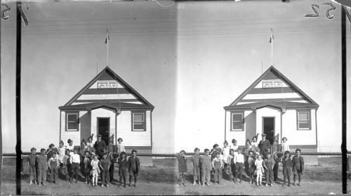 Canada Gov't Elevator, Three Millions Bushel Capacity, Moose Jaw, Sask. [Picture is of the Cobourg Schoolhouse with children, not of a grain elevator]