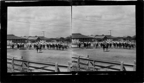 Same riding class standing at attention