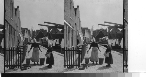 Shoes large and small - a family collection on wash day. Volendam, Holland