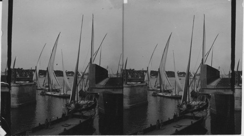 The great Nile bridge open for passage of freight boats- (N.E.), Cairo, Egypt